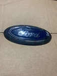 Genuine Grille Emblem JL3Z-8213-A. Fixed Price $133.33.