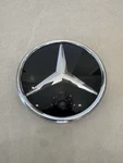 22-26 Mercedes Front Grille Emblem Base Plate Oem A000 888 (with Camera). Fixed Price $450.00.