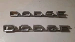 1958-60 Dodge Truck Emblem #1780007 Mopar Script Set. Fixed Price $85.00.