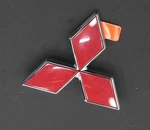 New Oem Mitsubishi Rear Red Triple Diamond Emblem MR339654 Eclipse 2000-2001. Fixed Price $34.75.