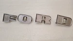 Vintage 1970-73 Ford Fomoco Tilt Cab Truck Hood Grille Emblems Letters. Fixed Price $74.99.
