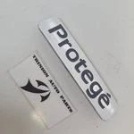 1999-2001 Mazda Protege Emblem Rear Lid Trunk Badge Logo Symbol Chrome Oem. Fixed Price $9.99.