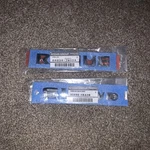 Oem (set Of 2) 2008-2015 Nissan Rogue Rear Liftgate Nameplates. Fixed Price $70.00.