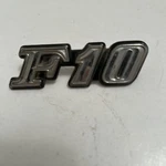 Datsun F10 Emblem Plastic Badge Oem 78802 M6900 Mid 70. Fixed Price $14.95.