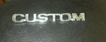 1976 1977 1978 Ford Truck "custom" Emblem #2. Fixed Price $28.00.