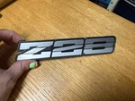 1982-1987 Chevrolet Camaro "Z28" Gray Rocker Emblem 20313783 Oem 82-87 No Pins. Fixed Price $16.73.