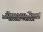 Vintage Hansen Ford Grand Forks North Dakota Metal Dealer Badge Emblem Trunk. Fixed Price $36.80.