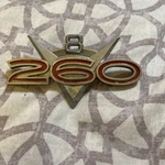 1962,63,64 Ford Fairlane, Falcon 260 V8 Fender Emblem Part # C20B-160144-B. Fixed Price $20.00.