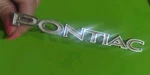 1973 Firebird Pontiac Emblem Gm Part # 485791. Fixed Price $12.99.