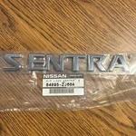 Genuine Nissan "sentra" Nameplate 2008-2012 84895-ZJ60A. Fixed Price $39.99.