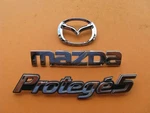 2002 2003 Mazda Protege 5 Rear Chrome Emblem Logo Badge Sign Set A32231. Fixed Price $40.00.