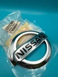 Oem Damage 2004 - 2022 Nissan Titan Rear Emblem Badge Tailgate Logo 934957S200. Fixed Price $45.99.