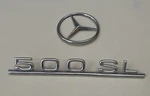 Mercedes 500SL, 107 817 09 15 Rear Trunk Logo Emblem Badge Sign Set. Fixed Price $59.00.