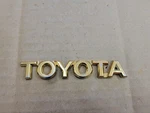 Toyota Oem 1999-2003 Solara Gold Rear Trunk Emblem Badge Logo Name 75447-06020. Fixed Price $17.99.