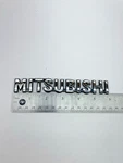 2008-21 Mitsubishi Eclipse Cross Lancer New Chrome Nameplate Emblem. Fixed Price $14.00.