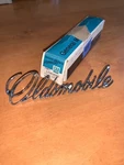 73-76 Nos Trunk Emblem 9858566 New In Box Oldsmobile. Fixed Price $99.99.
