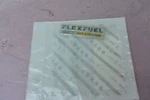 New Genuine Mopar Flex Fuel Emblem 04389988AA. Fixed Price $38.00.