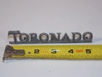 Vtg 1970 Oldsmobile Toronado Car Vehicle Trunk Badge Emblem 9864290. Fixed Price $19.00.
