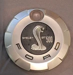 Mustang 2007-2009 Shelby GT500 Faux Gas Fuel Filler Door Cap / Emblem Oem. Fixed Price $100.00.
