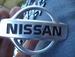 Nissan Classic Metal Badge Logo Emblem 8CMS Long, 5.5 Height.. Fixed Price $10.14.