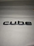 Cube Emblem 09-14 Nissan Rear Name Badge 90895-1FA0A Used. Fixed Price $16.00.