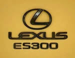 2002 - 2004 Lexus ES300 Black Pearl Rear Trunk Lid Emblem Logo Badge Sign Symbol. Fixed Price $37.99.