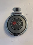 1966 Corvette Gas Door Assembly Gm 3874528 With Black Upper Corner Cross Flag. Fixed Price $69.99.