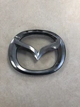 Mazda Chrome Plastic Clip On Emblem F-20116 Oem Badge. Fixed Price $14.00.