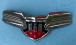 1942 Oldsmobile Hood Emblem Show Quality Part No. 143472. Fixed Price $188.00.