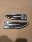 2010-2019 Ford Taurus Front D/s,p/s Fender Emblems Trim Silver/black Set Oem. Fixed Price $44.00.