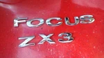 Focus ZX3 Emblem Oem Luggage Compartment 2004-2007 6S4Z-6142528-AA. Fixed Price $11.24.