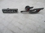 1975 Grand Prix 2-PIECE Console Nameplates 491089. Fixed Price $50.00.