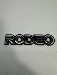 91-97 Isuzu Rodeo Front Fender Emblem Chrome Oem DMF03200. Fixed Price $11.89.
