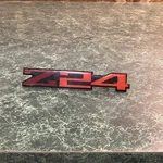 Genuine Oem "Z24" Logo Badge Emblem Nameplate P/n 14074099 Gm Cavalier Red. Fixed Price $44.95.