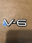 Nos Gm 22571273 Oem 1994 1998 Pontiac Grand Am V-6 Fender Emblem. Fixed Price $20.00.