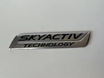 Mazda Skyactiv Technology Chrome Emblem Symbol Badge Oem GHK1-51771. Fixed Price $9.99.