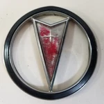 Pontiac Oem 1992-1995 Bonneville New Front Grille Emblem Badge Logo 16503785. Fixed Price $33.99.
