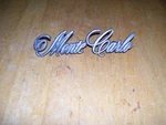 1970 1971 Chevrolet Monte Carlo Rear Panel Script Emblem Nameplate 801904 Oem. Fixed Price $25.00.