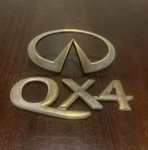 Oem Infiniti 97-03 QX4 Gold Rear End Emblem Badges 90894-1W311 -read. Fixed Price $45.00.