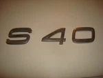 2000 Volvo S40 Rear Trunk Lid Deck Chrome Emblem Logo Badge Decal Letters Oem. Fixed Price $11.76.