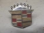 1973-74 Cadillac Oem Hood Emblem #1600858 By Vitrolux Gm. Fixed Price $30.00.