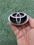 1998-2000 Toyota Corolla Grille Emblem Front Logo Badge 75311-02050 Oem. Fixed Price $18.00.