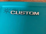 80'S Ford Custom Emblem Oem EOTB-16B114-C. Fixed Price $20.00.