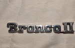 Rare Original Ford Bronco Ii Eddie Bauer Emblem W/ Part Number E47B-16B114-DA. Fixed Price $65.00.