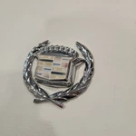 80 90 92 94 96 Cadillac Fleetwood Brougham Trunk Lock Wreath Emblem Swivel Orn. Fixed Price $145.00.