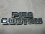 Ford "F-150 Custom" Badge # D7TB-16702-DWC, Oem. Metal All Pins!. Fixed Price $13.99.