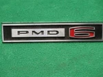9780110 Gm 1965 Pontiac Tempest PMD-6 Front Fender Emblem Ornament Cyl Nos. Fixed Price $39.95.