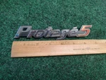 99 00 01 02 03 Mazda Protege 5 Rear Chrome Emblem Logo Badge Symbol Used Oem 4S4. Fixed Price $15.99.