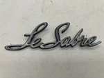 69-70 Buick Lesabre Fender Script Nameplate Emblem Used 8723359. Fixed Price $19.99.