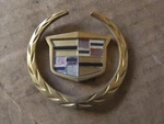 2005-11 Cadillac Sts Rear Lid Gold Wreath And Crest Emblems. Fixed Price $15.00.